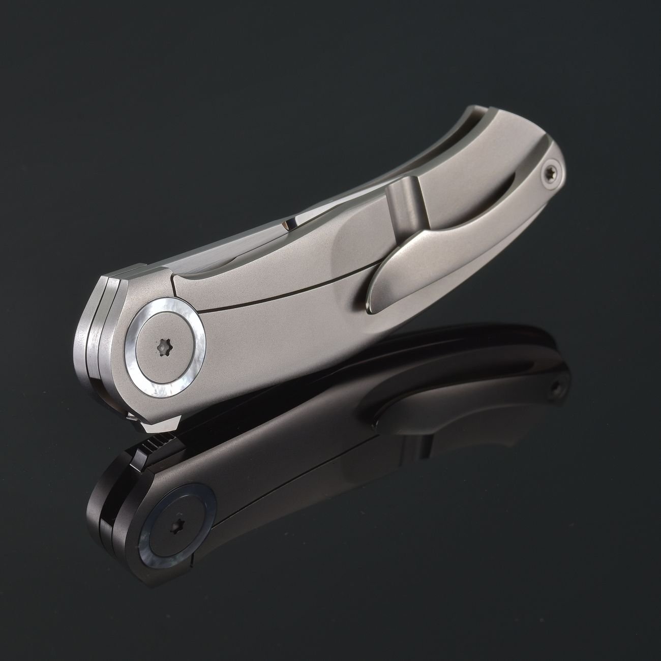 Folded stainless steel multi-tool compact design for hunting and outdoor use